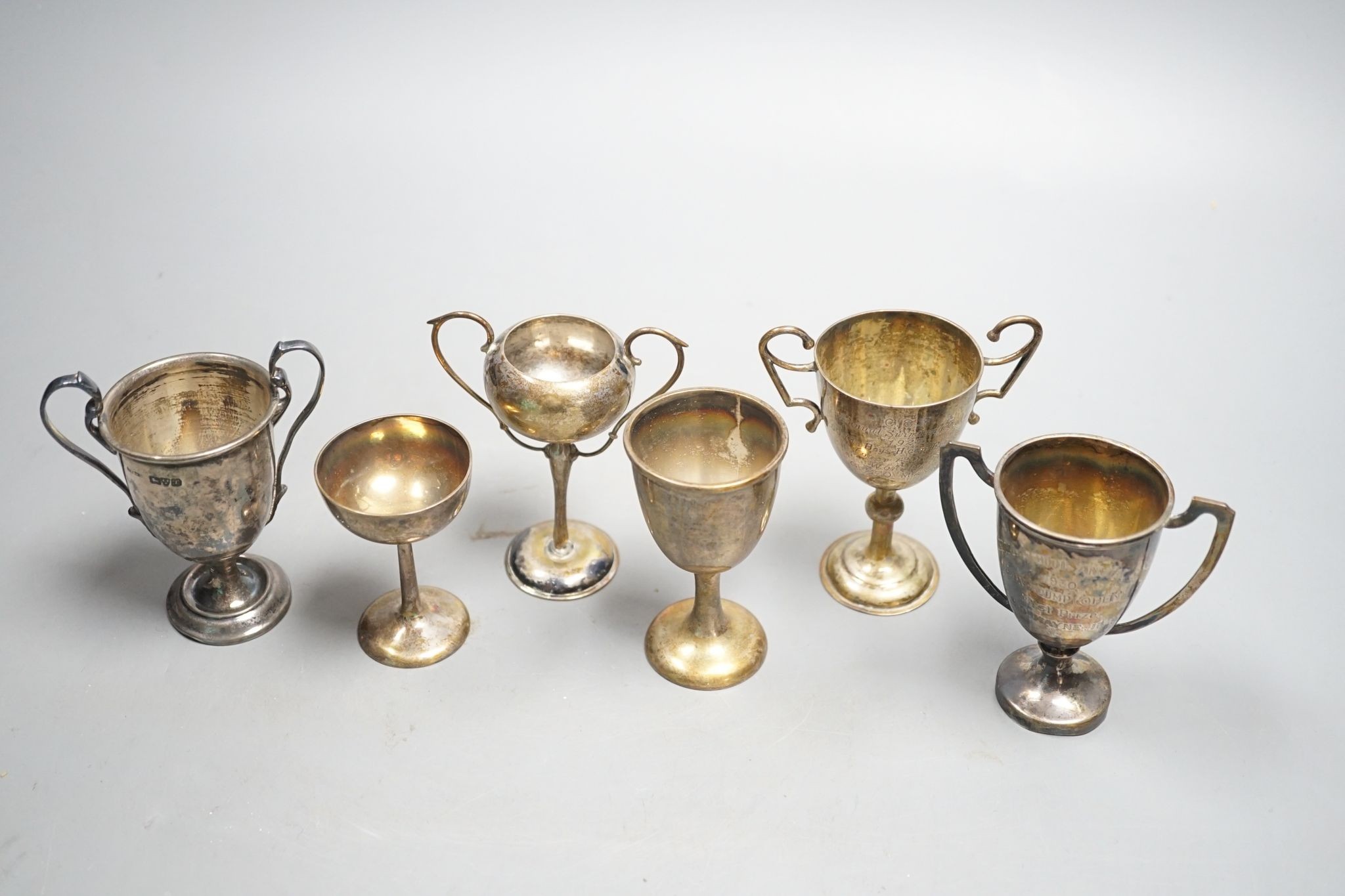 Five assorted small silver trophy cups